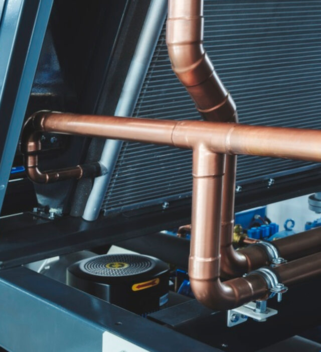 Copper,Tubes,In,An,Industrial,Cooling,Radiator,,Industrial,Concept