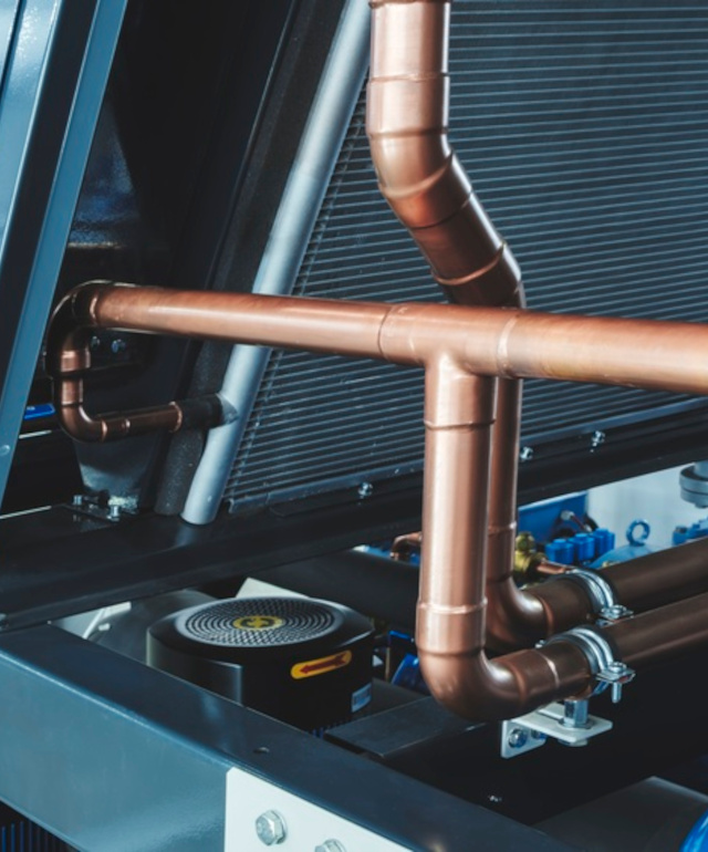 Copper,Tubes,In,An,Industrial,Cooling,Radiator,,Industrial,Concept